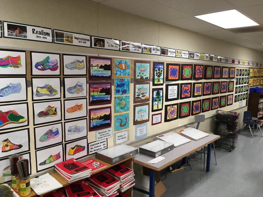 Student artwork gallery wall